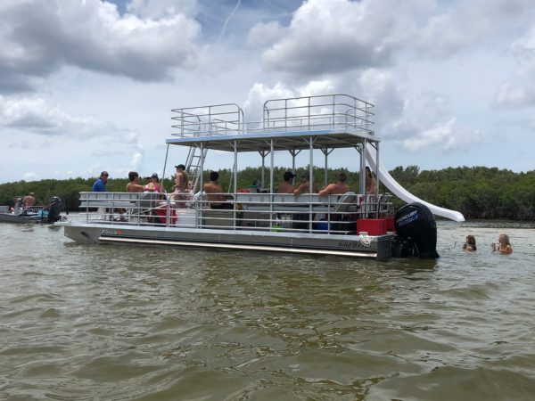 Twin Rivers Marina 30-foot double-decker pontoon known as "The Pearl" even has 2 waterslides!